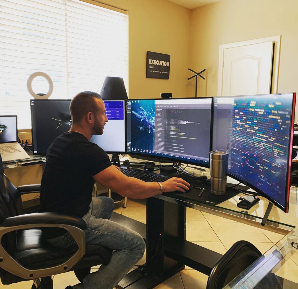 Eric Zhivalyuk ewoah working on robust desktop with many monitors - ewoah Technology Leader Serial Entrepreneur Eric Zhivalyuk ewoah working on robust desktop with many monitors