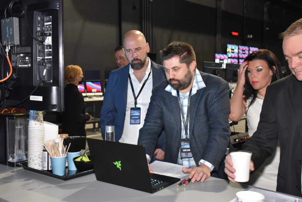 Ilija Cankovic and John Crim Working Behind the Scenes Control Room at iHub Global Launch Event in Las Vegas at Worre Studios