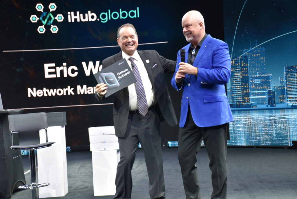 Rick Cotton and Eric Worre on Stage at iHub Global Launch Event in Las Vegas at Worre Studios